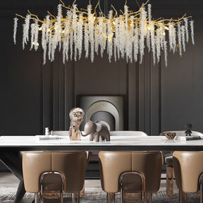 Flavia Gold Coin Crystal Linear Branch Chandelier Over Dining Table